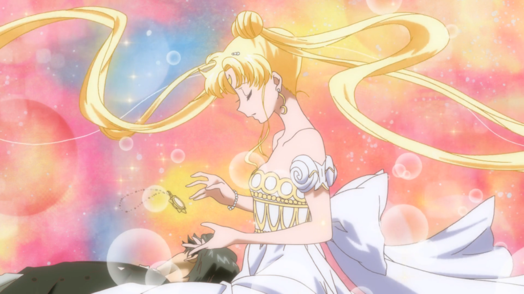 Mamoru Chiba lying in the lap of Usagi Tsukino from the anime Pretty Guardian Sailor Moon Crystal.