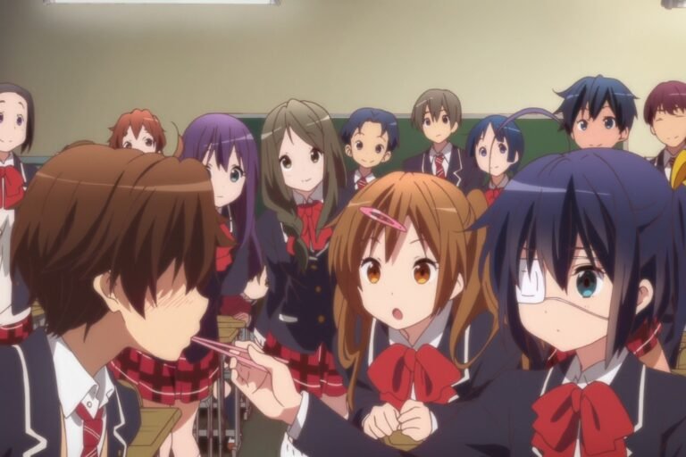 A scene of Rikka Takanashi feeding Yuuta Togashi in front of the whole classroom from the anime Love, Chunibyo & Other Delusions!