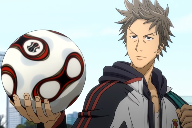 A scene of Takeshi Tatsumi holding a ball from the anime Giant Killing.